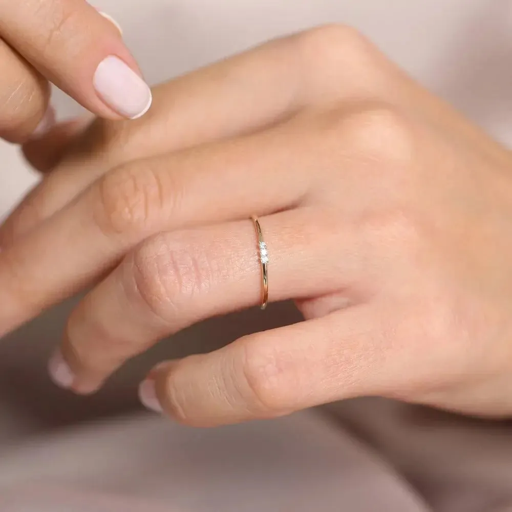 0.05CTW Round Cut Three Stone Diamond Wedding Band