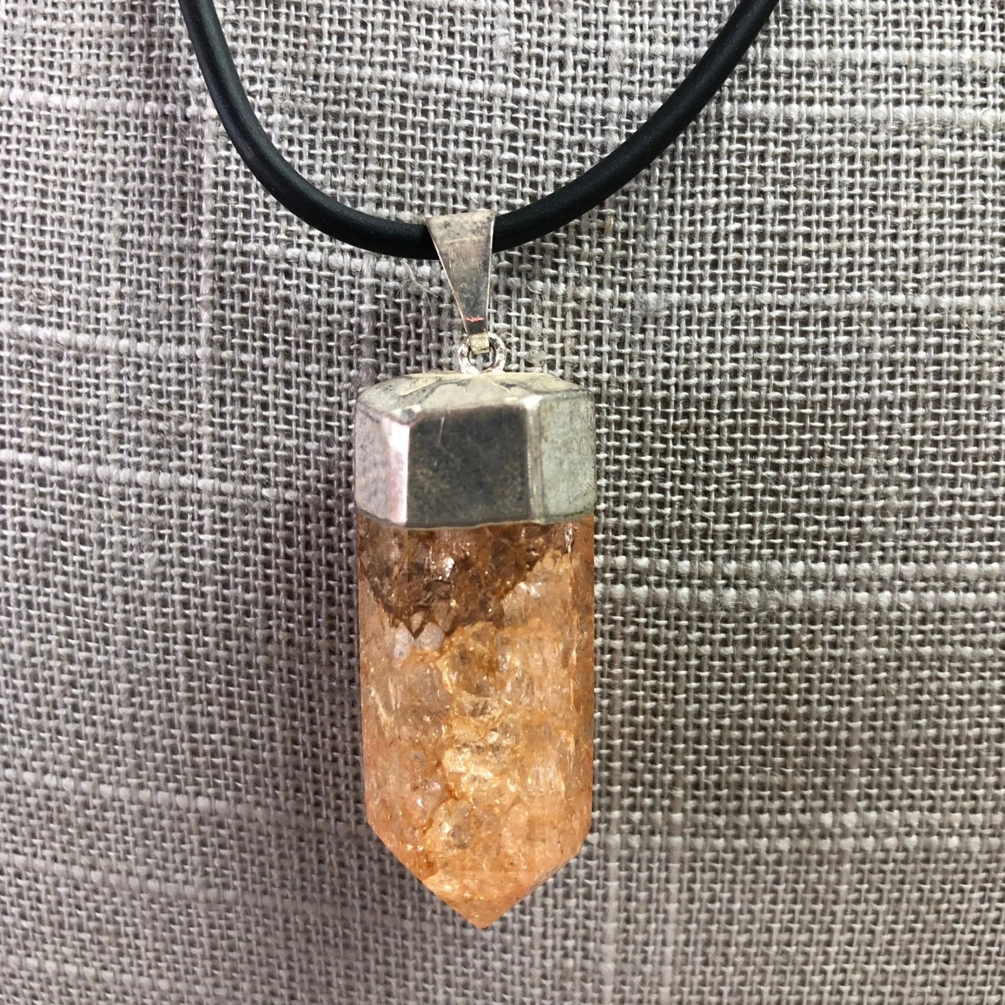Orange Crackle Quartz On 20 Inch Black Rubber Necklace