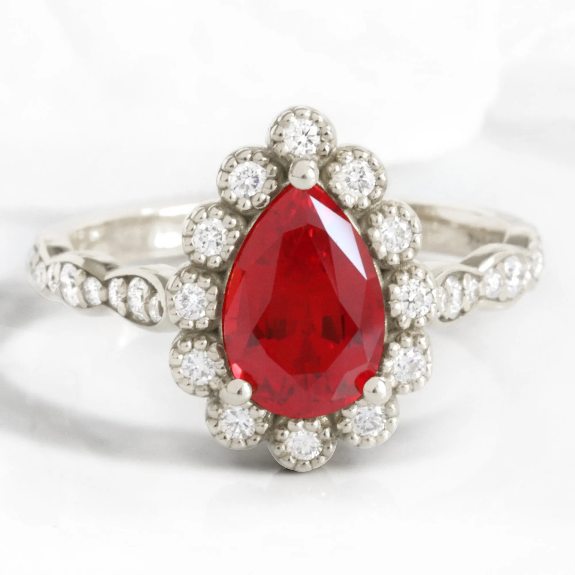 Pear Ruby Engagement Ring in Vintage Luna Halo Diamond Ring