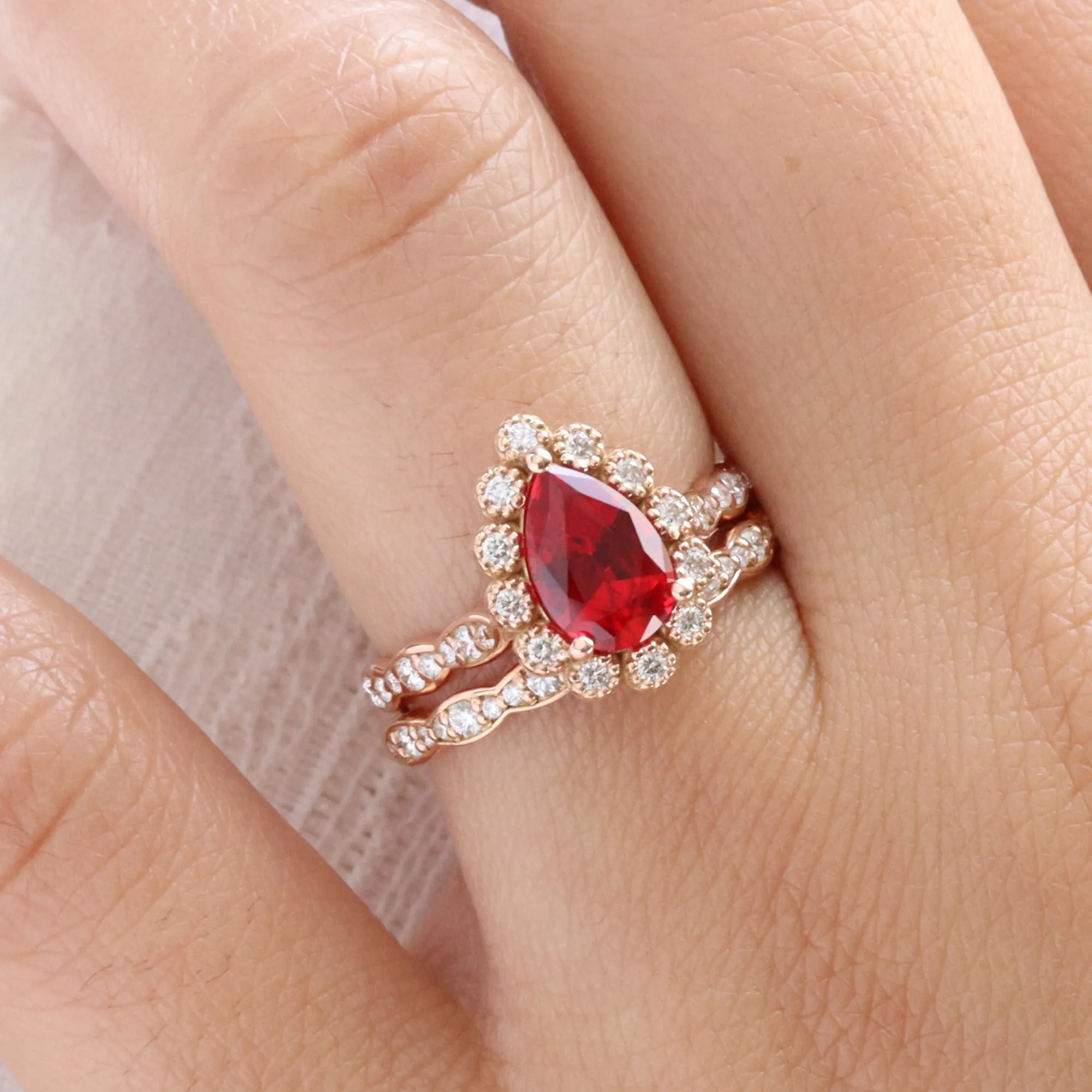 Pear Ruby Engagement Ring in Vintage Luna Halo Diamond Ring