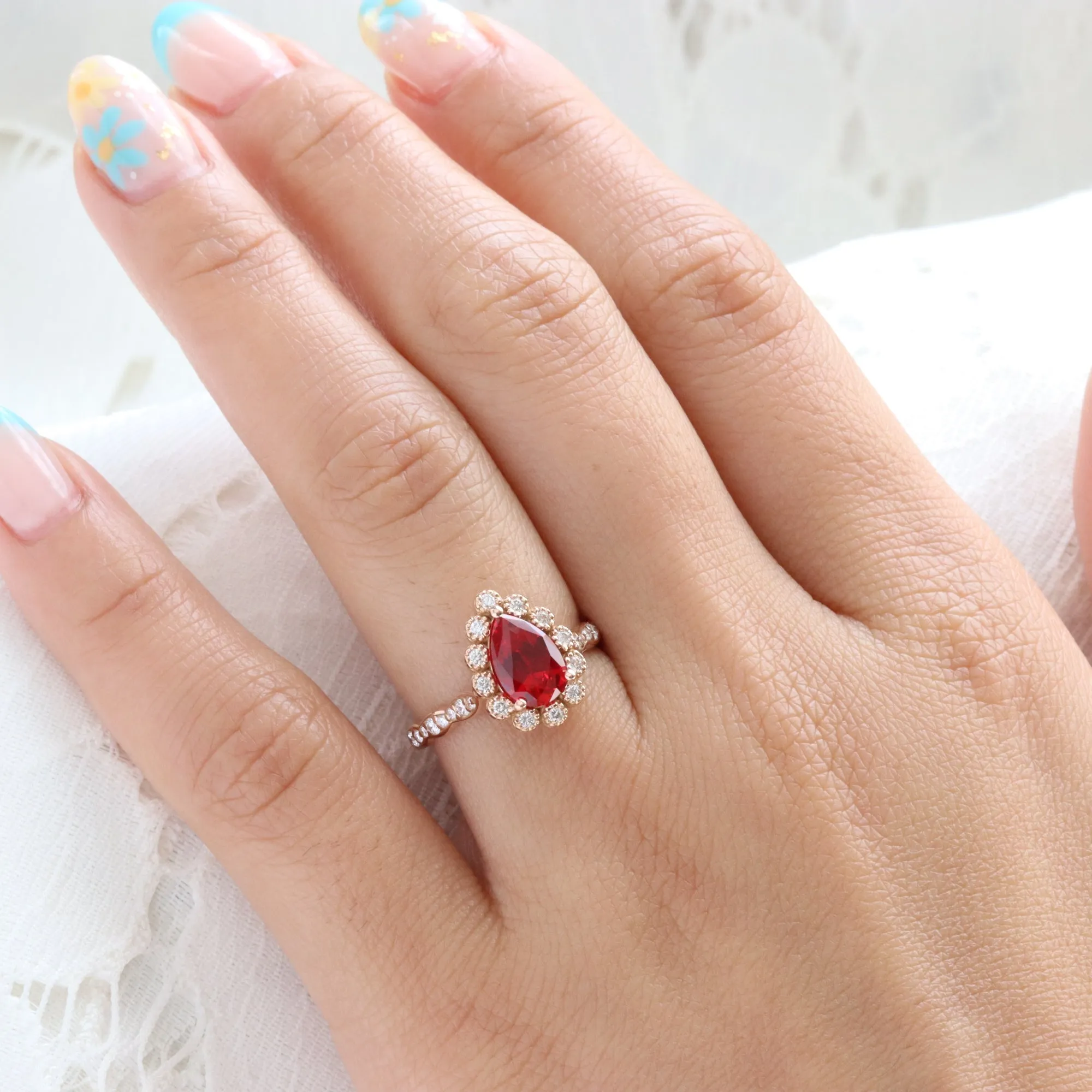 Pear Ruby Engagement Ring in Vintage Luna Halo Diamond Ring