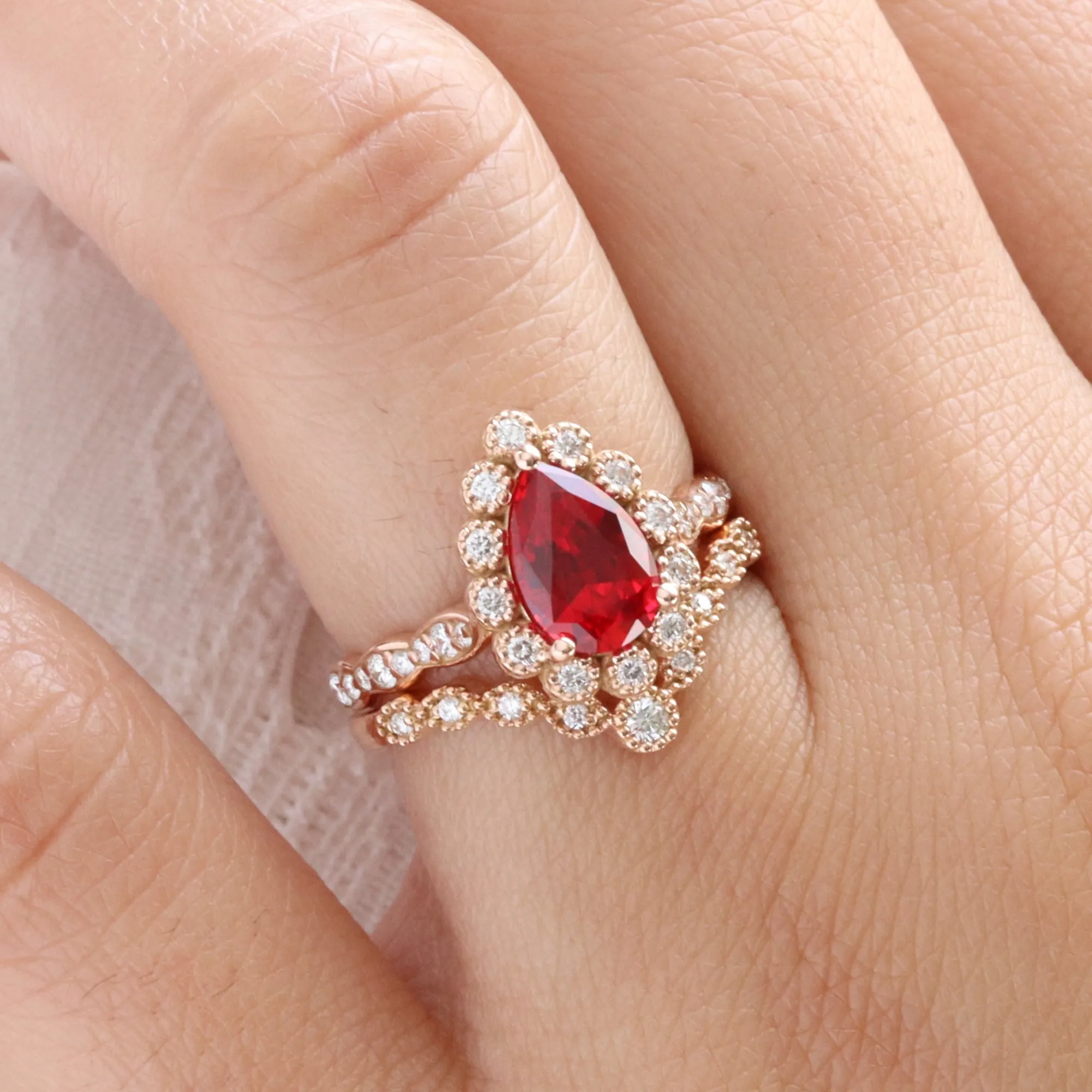 Pear Ruby Engagement Ring in Vintage Luna Halo Diamond Ring