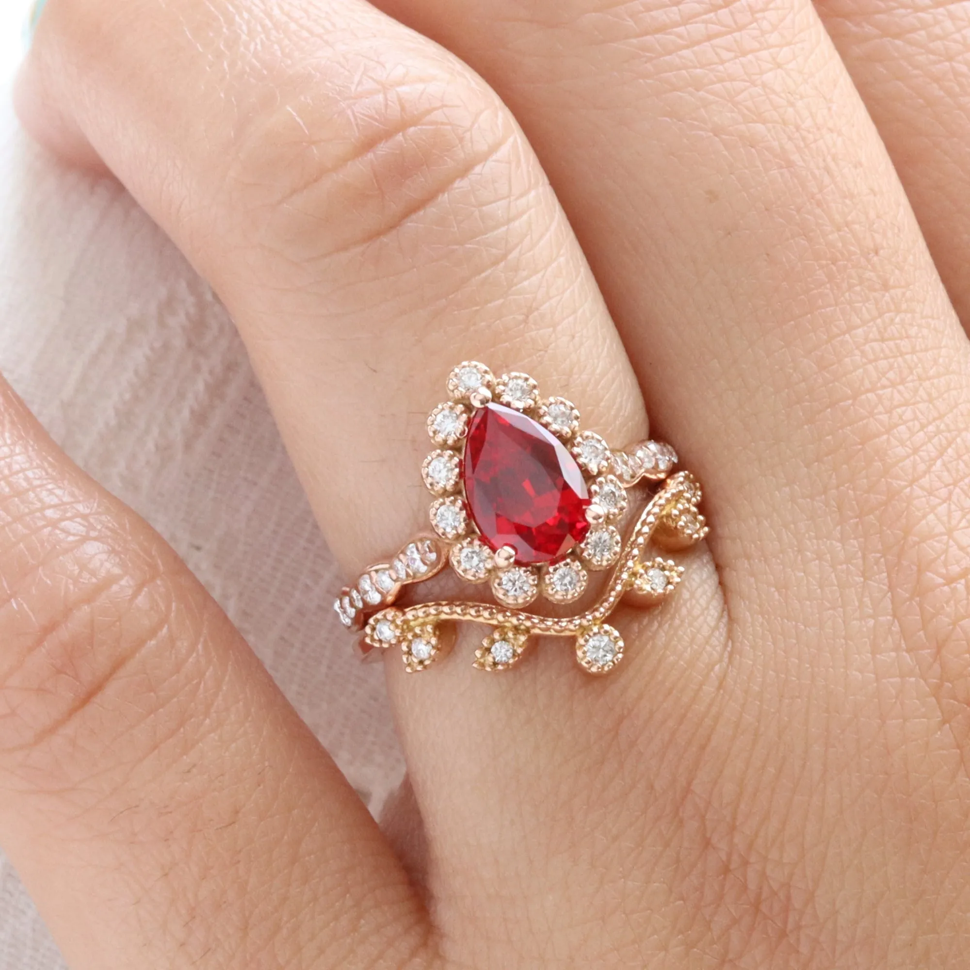 Pear Ruby Engagement Ring in Vintage Luna Halo Diamond Ring