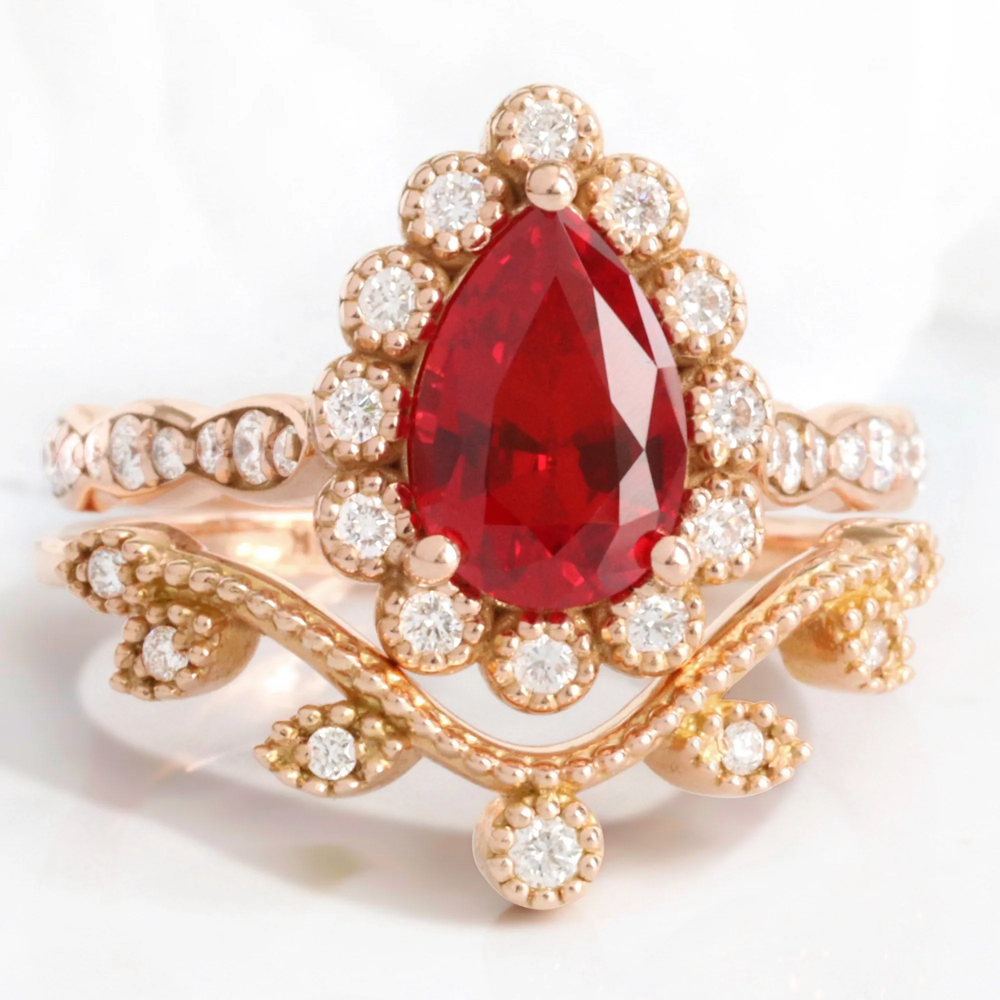 Pear Ruby Engagement Ring in Vintage Luna Halo Diamond Ring