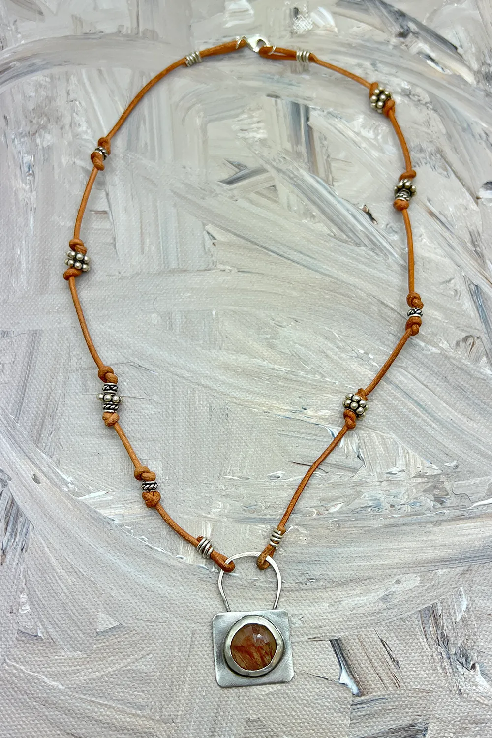 Rutilated Quartz   Leather