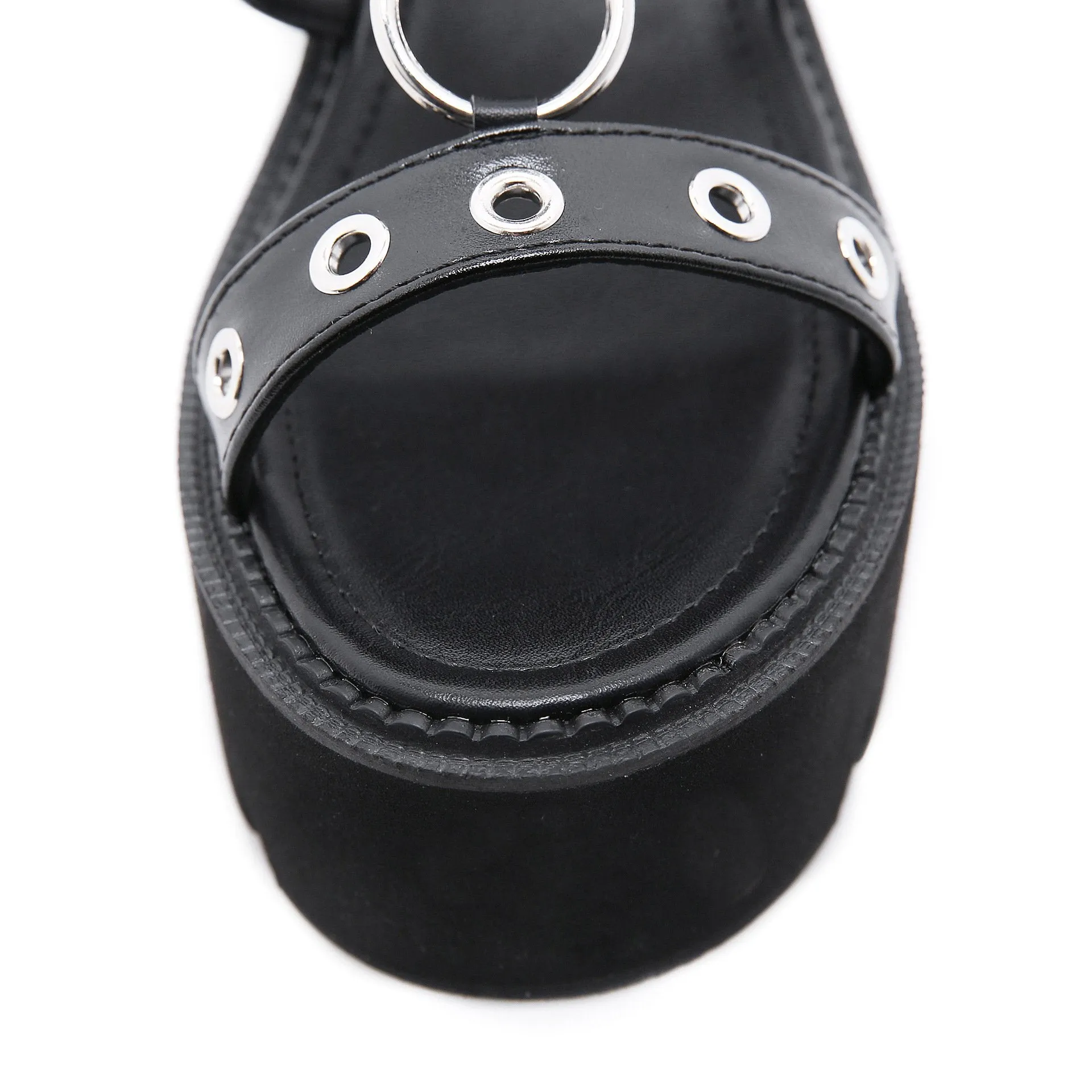 Women hollow studded strap 
chunky platform metal ring 
roman sandals