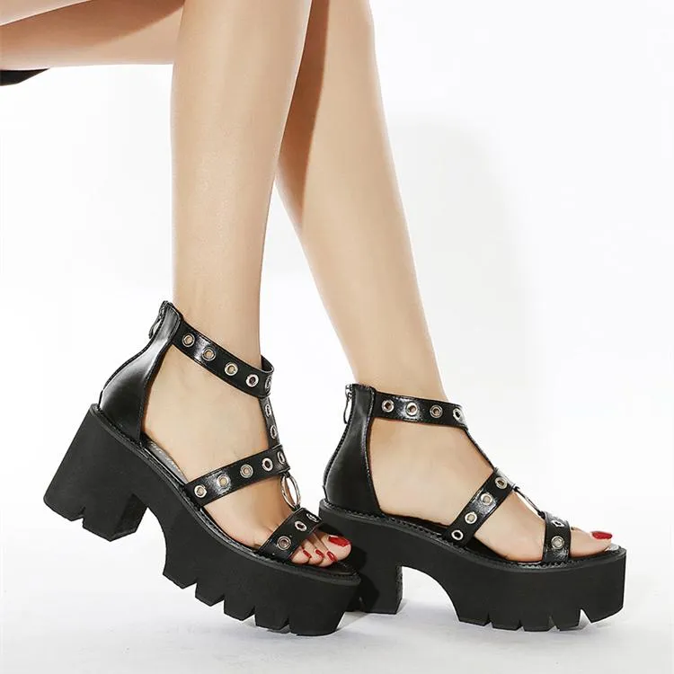 Women hollow studded strap 
chunky platform metal ring 
roman sandals